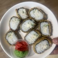 California rolls tempura style- tofu cheese, cucumber, lettuce, vegan cream cheese, nori sheet, rice in mitsuken sauce, and GF batter  at Veggie House in Astana