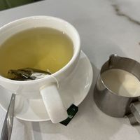 Green tea with unsweetened almond milk   at Veggie House in Astana