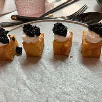 1,000 LAYER CRISPY POTATOES

caviar, sour cream, chives at PLANTA - Yorkville in Toronto