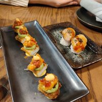 Crispy rice on left, sushi on right at PLANTA - Yorkville in Toronto
