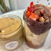 Porridge with added pb & acai porridge with lots of toppings at Superfood Deli - Mariahilfer in Vienna