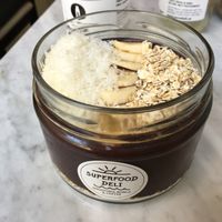 Modified açaí bowl with raw oats instead of granola  at Superfood Deli - Mariahilfer in Vienna