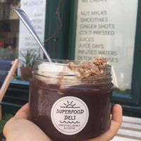 Large Açai Bowl topped with Banana, Coconut shreds and Granola at Superfood Deli - Mariahilfer in Vienna