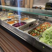 Salad bar to choose toppings   at KartoffelKonig in Munich