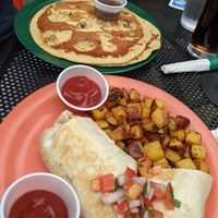 Vegan breakfast burrito, hash browns and vegan banana pancakes! at The Friendly Toast in Boston