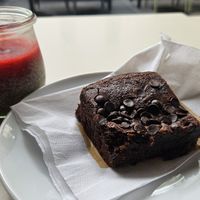 Vegan chia pudding with raspberry and vegan chocolate brownie at Cafe Como in Klagenfurt
