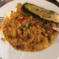 Vegetable risotto (and a piece of zucchini from the grilled veggie plate)  at Konoba Bonaca in Zadar