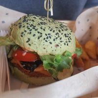 Vegan burger with oven baked potato at Flower Burger in Rome