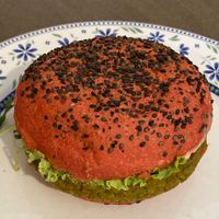 Cherry bomb, with lentil burger, confit tomatoes, salad, soy sprouts, vegan cheddar, rocktail sauce  at Flower Burger in Rome