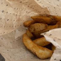 Spicy potato wedges  at Flower Burger in Rome
