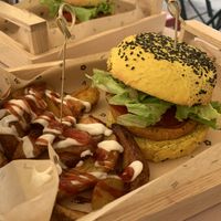 Spicy Cecio and patatas buenas  at Flower Burger in Rome