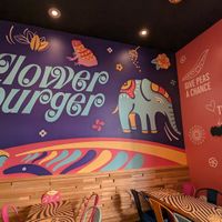 Loved the colorful decor and seating at Flower Burger in Rome