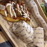 Skin on chips with sauces  at Flower Burger in Rome