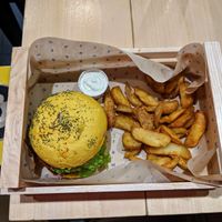 Spicy burger with fries and vegan mayo at Flower Burger in Rome