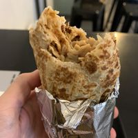 Vegan burriño with whole grain rice, pinto beans, soy chunks, tomato, guacamole, tomatoes and mango habanero sauce. #Veganuary at Burreatos in Stuttgart