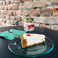 Vegan raw cheesecake and oats with coco milk. at Salted Cafe in Sofia