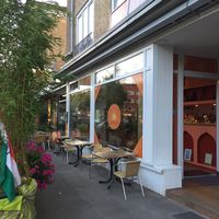 Outdoor seating - unfortunately the street is quite busy  at Osho Ayuleela in Hamburg