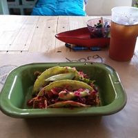 Delicious breaded tofu tacos. By far the greatest vegan taco I've ever had. I forgot what the drink was called but it was also very delicious. It's made with lemonade, brown sugar and chia seeds. at Chia Fonda Vegana in Guadalajara