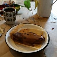 Vegan chocolate tamale with a cup of black coffee. at Chia Fonda Vegana in Guadalajara