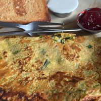 Chickpea omelette and toast with cashew cream and jam  at TATTV Cafe in Rishikesh
