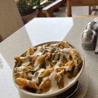 Vegan tomato pesto pasta with cashew cream cheese   at TATTV Cafe in Rishikesh
