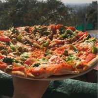 Vegan pizza at TATTV Cafe in Rishikesh