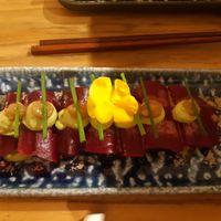 Rawvioli met rode biet gevuld met bieslook kaas en gekarameliseerde uien at Hearth  in Amsterdam