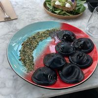 Black charcoal ravioli at Hearth  in Amsterdam