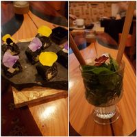 Flower petals adorn the dishes. at Hearth  in Amsterdam