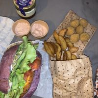 Flower burger, wedges, olive side dish, magik sauce and tiramisu    at Flower Burger - Porta Genova in Milan