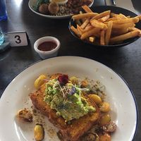 Smashed avo on delicious soft pumpkin bread, chips, Buddha bowl at Ozmosis in Edge Hill