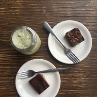Raw desserts and an almond milk matcha latte. at Pineapple Cafe in Cairns