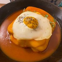 Francesinha with Tofu, Seitan, vegan cheese, vegan egg and chips as side dish at Outro Lado in Faro