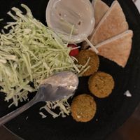 The only thing that was fresh was the plain cabbage. The pita was stale, the falafel was deep fried from the freezer.  at Gojo Paradiso in Kyoto