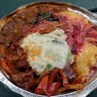 A medium lunch - seitan, spareribs, cornmeal, plus potatoes & salad at Vegan's Delight in Bronx