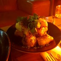 Side of roast potatoes roasted in Rosemary at Mrs Jones in Devonport