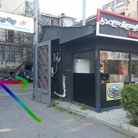 Go through courtyard gates next to Thai restaurant, building on the right at Hummusbar in Tbilisi