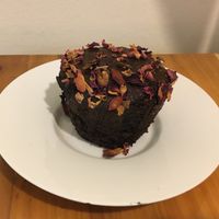 Vegan chocolate goji muffin (on a plate from my home).  at Juice Generation - 8th Ave in New York City