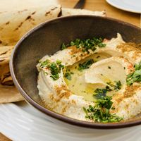 Homemade hummus- you’ll lick  the bowl clean  at Mezze Restaurant in Kralendijk