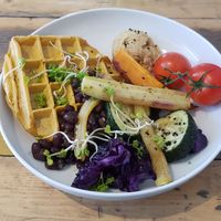 Sweet potato waffle with hummus and grilled veggies at Lunchcafe Curcuma in Gouda