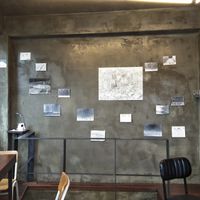 Nice industrial interior with art show. at Unknown Coffee - 언노운커피 in Seoul