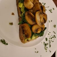 Mushrooms on toasted sourdough with avocado & wilted spinach. at Ambleside Manor in Ambleside