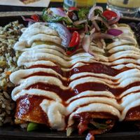Enchiladas with half red and half green sauce at Nacho Daddy - The Strip in Las Vegas