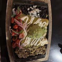 Vegan enchiladas with added guacamole   at Nacho Daddy - The Strip in Las Vegas