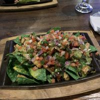 Vegan chick’n nachos were amazing. Loved the spinach nacho chips    at Nacho Daddy - The Strip in Las Vegas