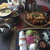 Vegan queso, guac, and vegan chick’n fajitas at Nacho Daddy - The Strip in Las Vegas