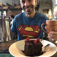Happy 40th - so happy with his huge piece of vegan birthday cake and a really good coffee  at Nacho Daddy - The Strip in Las Vegas