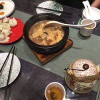 sizzling tofu, teapot and dumplings  at Vegetarian Dumpling in Beijing