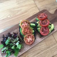 Avocado on toast with pesto  at Nourish Cafe in Yangon