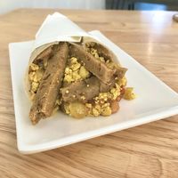 Breakfast burrito with tofu & seitan  at Nourish Cafe in Yangon